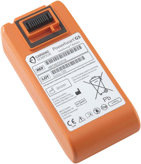 Batteri till hjärtstartare. Ett oranget batteri med vitt klistermärke med text. 