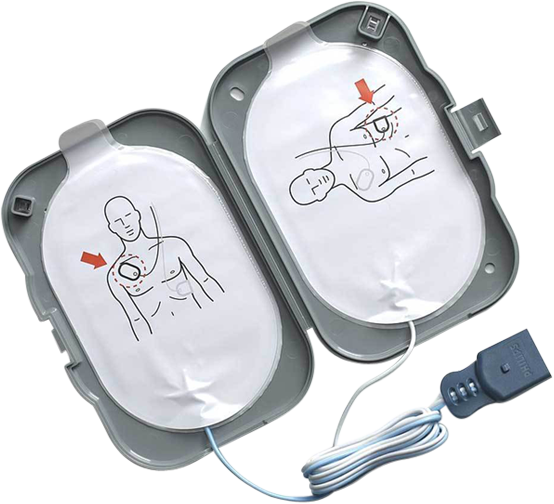 Elektroder till hjärtstartare. Elektroderna är vita med en streckgubbe på och de ligger i en grå förpackning. 
