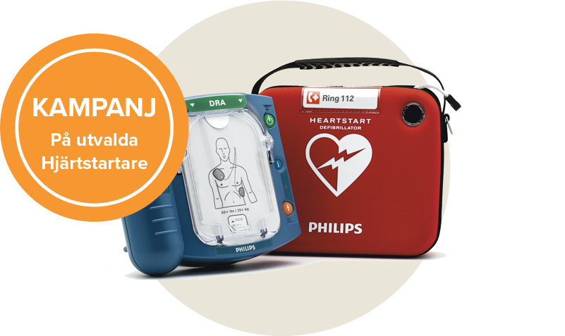 Philips HS1 hjärtstartarpaket. En blå hjärtstartare och en röd Philips väska. Etikett: Kampanj på utvalda hjärtstartare.